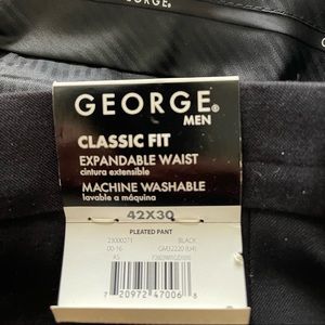 George Brand New pleated black dress pants with expandable waist band. Brand New